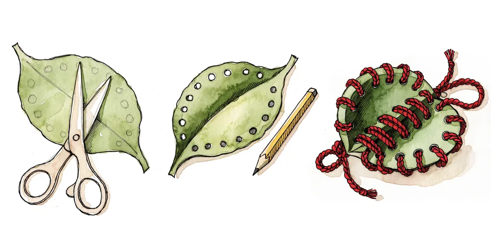 Stitch a leaf like Tara: a paper leaf, a hole punch and red yarn.